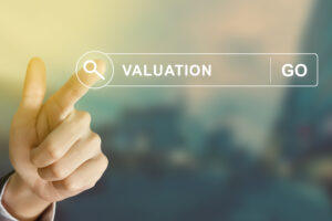 business hand clicking valuation button on search toolbar